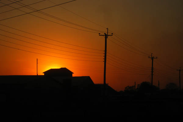 Sunset in a wealthier Juba neighbourhood with city electricity